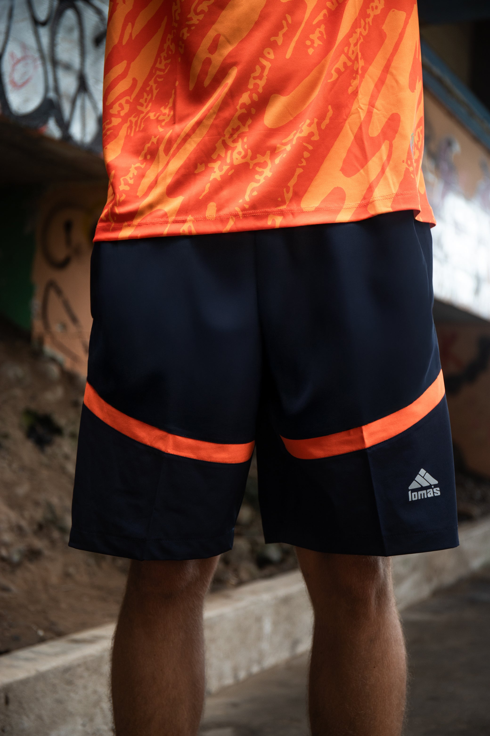 Short Lomas Active Flex Azul noche c/ Naranja